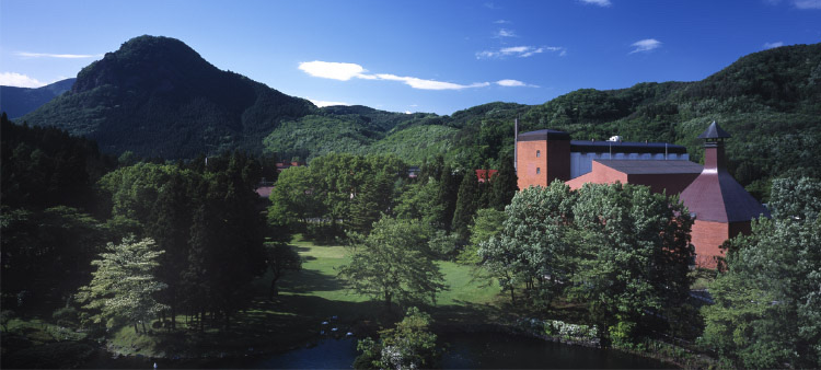  An aerial view of Miyagikyo Distillery surrounded by lush green forest in Sendai, Miyagi Prefecture.