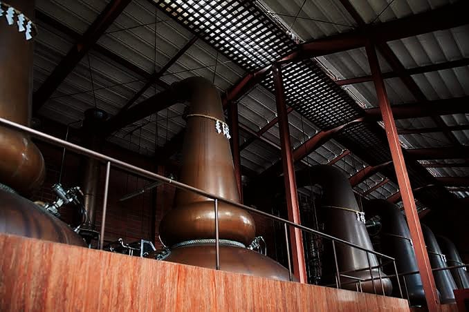  Shining copper stills at Miyagikyo Distillery used in the whisky distillation process.