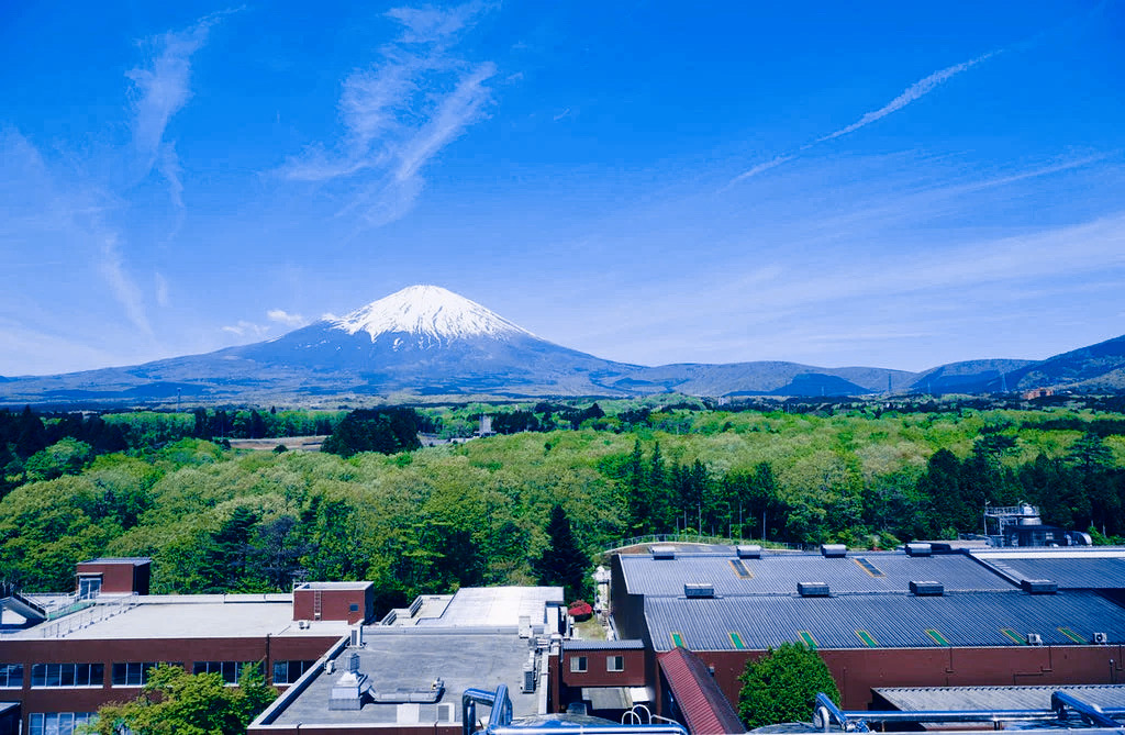 Overview of Kirin Gotemba Distillery nestled at the base of Mt. Fuji, showcasing Japanese craftsmanship and premium whisky productionO