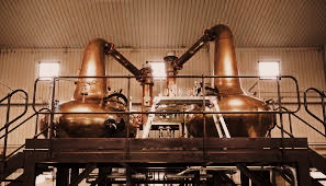 Chichibu Distillery’s copper stills used in the production of premium Japanese whisky, highlighting traditional craftsmanship and innovative techniques.