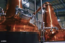 Copper pot stills at Mars Iwai Distillery, essential for crafting refined whisky.