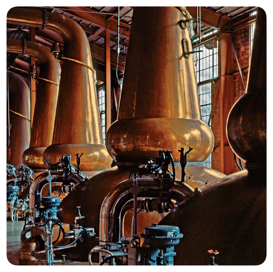 Copper pot stills at Mars Iwai Distillery, essential for crafting refined whisky.