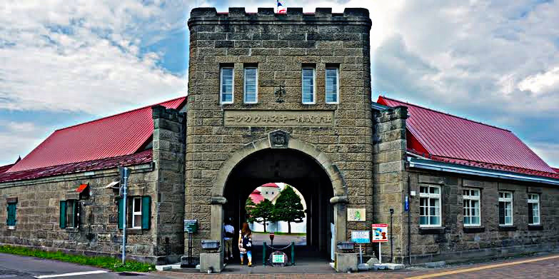 “Yoichi Distillery in Hokkaido, Japan, a must-visit for whisky lovers and enthusiasts, known for its traditional whisky craftsmanship and coastal location.”