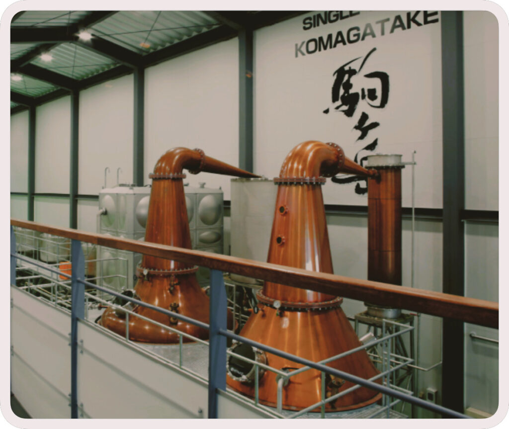  Insight into the double distillation process at Mars Komagatake Distillery, perfecting whisky for enthusiasts and connoisseurs.