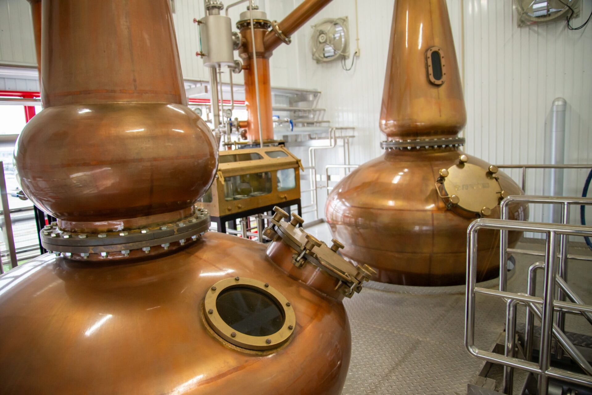 Traditional Japanese whisky distillery with barrels and misty mountains – Yamazaki, Nikka, Chichibu