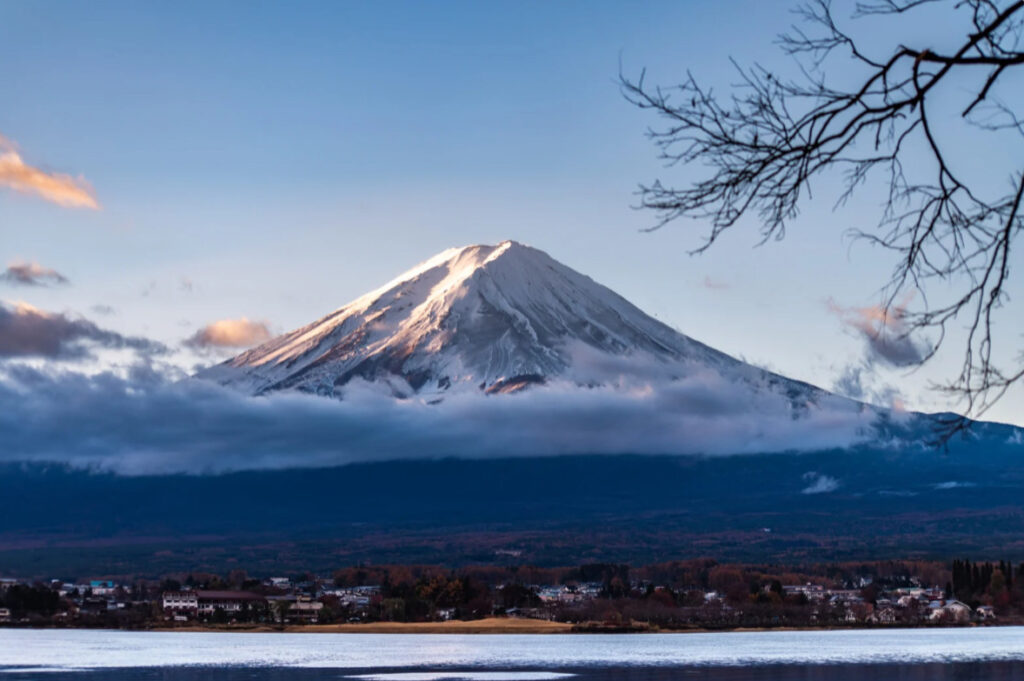 Traditional Japanese whisky distillery with barrels and misty mountains – Yamazaki, Nikka, Chichibu