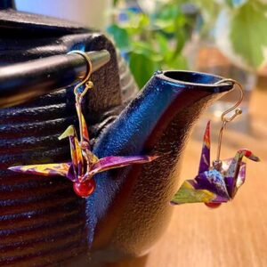 Authentic Japanese origami crafts, featuring traditional paper folding art used in decorations, gifts, and cultural symbolism.