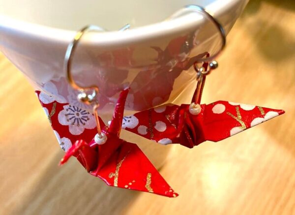 Authentic Japanese origami crafts, featuring traditional paper folding art used in decorations, gifts, and cultural symbolism.