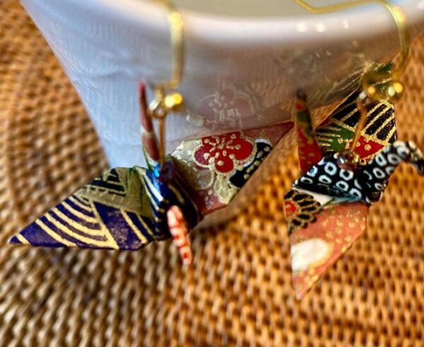 Authentic Japanese origami crafts, featuring traditional paper folding art used in decorations, gifts, and cultural symbolism.