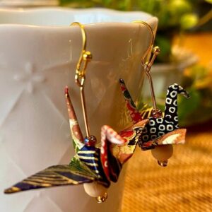 Authentic Japanese origami crafts, featuring traditional paper folding art used in decorations, gifts, and cultural symbolism.