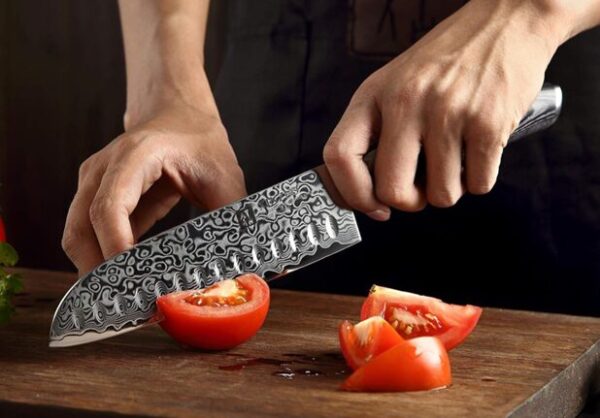 Handcrafted Japanese kitchen knife made from high-carbon steel, featuring razor-sharp precision and a traditional Japanese design, perfect for professional chefs and home cooking.